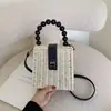 Bolso Bandolera Tejido de Cuentas de Madera Portátil para Playa de Verano Bolso de Mano con Cierre Nuevo Primavera 2025 Bolso Transfronterizo
