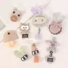 Mancha directa ojos de dibujos animados oscuros borla pentagonal conejo ropa infantil hecho a mano DIY pegatinas de tela accesorios accesorios