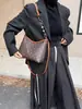 Versión coreana 2026 nueva bolsa vintage floral para el hombro para mujer, bolso de hombro y cruzado de alta gama, bolso tote versátil de moda, bolso de mano