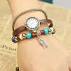 Lote Mixto moda elegante todo-fósforo reloj pulsera piel de vaca colgante pez pequeño reloj pulsera estudiante reloj pulsera cuero genuino para mujer