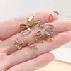 Venta Caliente Transfronteriza Acero Inoxidable Patrón Flor de Girasol Broche Clip Conector Hebilla Accesorios para Joyería Hecha a Mano DIY Venta al por Mayor