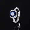 2024 nueva joyería Huabi cobre chapado en oro retro simulación cristal azul afilado cuadrado grueso estilo simple traje femenino 8*8