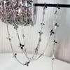 Cadenas de cuentas DIY, cadenas con borlas de trébol de cuatro hojas chapadas en metal, accesorios de cuentas para ropa, venta al por mayor