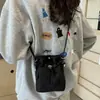 Bolso Pequeño Simple de Moda Personalizado Tela de Cuadros Primavera/Verano 2026 Bolso para Teléfono Cruzado de un Solo Hombro Bolso Pequeño Multifuncional con Cordón