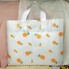 Bolsa de plástico translúcida verde fruta, embalaje portátil, bolsa de compras para ropa de regalo, ropa para niños, caja de zapatos, bolsa con logotipo