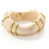 Coleção de pulseiras de resina com rebites irregulares e modernas transfronteiriças para mulheres, pulseiras de moda europeia e americana personalizadas e exageradas no atacado
