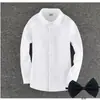 Camisa de primavera 2023 para niños versión coreana de camiseta interior de manga larga para niños color liso camisa para bebé ropa para niños una generación de pelo