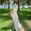 Vestido de tirantes floral suave estilo francés para mujer, verano, vacaciones en la playa, cola con volantes de alta gama, vestido largo