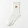 Calcetines blancos de algodón de Xinjiang para mujer, 100% algodón puro, calcetines de media pantorrilla con ribete de encaje, estilo japonés moderno, caricatura linda, diseño sin costuras
