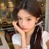 Horquilla con Borla de Lazo de Cuentas de Cristal Súper Hada Dulce Temperamento Pin de Pato de Moda Versátil Accesorios para el Cabello de Gama Alta Venta al por Mayor