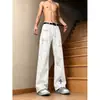 Jeans de mezclilla cruzada estilo americano para hombre, con un diseño único de pedrería, lavado de pierna recta, ligeramente acampanados