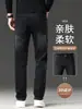Jeans de alta gama 2026 modelo nuevo para hombre, pantalones casuales elásticos de primavera y otoño para hombre, corte recto holgado, pantalones de otoño para hombres de mediana edad