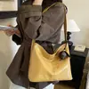 Bolsa tote grande capacidade outono e inverno para mulheres, nova moda 2026 elegante de ombro e transversal, bolsa de axila de alta qualidade