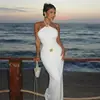 Roupas Femininas Estilo Europeu e Americano Nova Moda Primavera e Verão 2026 Cor Sólida Sem Mangas Gola Halter Ajustada na Cintura Costas Abertas Sexy Vestido