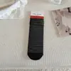 Calcetines de mujer al por mayor de Acheng: calcetines de algodón a rayas estilo coreano de media pantorrilla, sin costuras para primavera y otoño, calcetines holgados transpirables y absorbentes del sudor