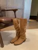 Versión de cuero de botas de montar para mujer que aumentan la altura y hacen que las piernas parezcan más largas, botas largas de punta redonda con tacón grueso, correa cruzada con hebilla, botas de vaquero occidentales