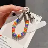 Cable de teléfono elástico colorido cordón para teléfono móvil muñeca llavero corto bolsa colgante resistente anti-pérdida estilo ins nuevo