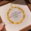 Brilho de Cristal Laranja! Pulseira Oval de Zircônia com um Toque Levemente Luxuoso e de Alta Qualidade, Acessório de Mão Moderno e Versátil com um Design Único