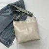 Bolsa de design de nicho para mulheres 2024 Nova bolsa de ombro retrô casual Lady bucket bag moda saco mensageiro simples