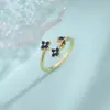 Anillo de Zirconia Azul de Cuatro Hojas Regalo de Cumpleaños Popular en Plataformas Independientes Anillo de Dedo Índice Flor Hoja de Diamante Blanco Transfronterizo