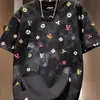 Moda Transfronteriza Estampada Cuello Redondo Verano 2026 Nuevo Estilo Manga Corta Lujo Ligero Marca de Moda Popular Camiseta Holgada Media Manga para Hombre Venta al por Mayor
