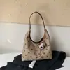 Bolso de mano para mujer transfronterizo colección otoño 2026: diseño único, estampado de lunares, bolso de hombro versátil, bolso tote y de axila retro a la moda