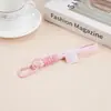 Nuevo Llavero de Dibujos Animados Colorido Cordón de Nailon Metal Bolso Muñeco Figura Colgante de Cuentas Mosquetón Tejido