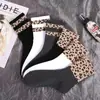 Meias quentes transfronteiriças femininas outono e inverno estampa de leopardo sola alta borracha grossa terry quente para casa meias de cano longo atacado