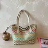 Bolso tejido de gran capacidad para mujer, nuevo modelo 2026, bolso de hombro de gran capacidad, bolso de mano tipo cesta de verduras, bolso de paja de regalo