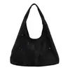 Bolsa de axila com design único para mulheres, nova coleção outono/inverno 2026, bolsa de ombro retrô vazada, versátil e adequada para o dia a dia