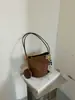 Bolso de cubo de moda para otoño para mujer, bolso de hombro de nicho de moda estilo coreano, bolso de mano vintage de gamuza para el día a día