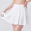 Conjunto de yoga feminino, saia evasê, design anti-exposição, saia curta falsa de duas peças, possui um bolso traseiro, secagem rápida, respirável, durável e resistente a rugas