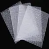 Suministro Directo en Stock de Bolsas de Burbujas Transparentes de Nuevo Material 15*20cm Plástico de Burbujas Bolsas de Espuma Espesada Bolsas de Burbujas Empaquetadas en Varios Estilos