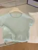 Top de punto texturizado de manga corta para mujer, fresco y sencillo, con abertura en la espalda, estilo fino de verano, camiseta interior dulce y atrevida para chica