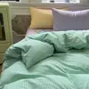 Conjunto de tres piezas estilo blogger con bloques de color para dormitorio estudiantil, conjunto de cuatro piezas de gasa fruncida a rayas de algodón puro, sábana de algodón lavado