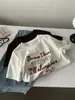 Camiseta de Verano Vintage para Mujer Talla Grande 100kg Extra Grande Color Café Bordado de Letras Cuello Redondo Manga Corta Versátil Adelgazante