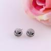 Pendientes de calavera de diamantes sencillos de moda europea y americana para Halloween, personalizados, con separación de colores para hombres y mujeres.