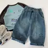 Jeans para niños Mai Bao 2026 estilo nuevo de invierno para niños pantalones elegantes de pierna curva con estrellas ajuste holgado pantalones dropshipping