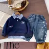 Ropa para niños, conjunto de primavera y otoño para niños, conjunto de dos piezas: una sudadera y pantalones de cuadros de nuevo estilo, conjunto superior y pantalones estilo coreano para niños