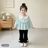 Camisa de manga larga para niña, estilo nuevo, para primavera y otoño, camisa tipo muñeca, top casual versátil para bebés niñas