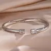 RAKOL Moda Luxo Leve Cobre Incrustado Zircônia Trevo de Quatro Folhas Aberto Ajustável Pulseira Feminina Nicho Toque de Alto Padrão Joia de Mão