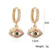 Pendientes pequeños transfronterizos Aogu con diseño de ojo de diablo de circonita bañados en oro y cobre para mujer, pendientes personalizados con un nicho de sentido del diseño INS