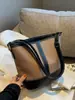 Moda Transfronteriza 2025 Otoño e Invierno Nuevo Bolso Cubo Simple de Gran Capacidad Versátil para el Trabajo Bolso Cruzado de Hombro para Mujer