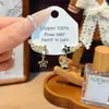 Pendientes de estrella estilo Ins, geniales y elegantes, para mujer, pendientes de botón de lujo ligero, nicho, alta gama, joyería para orejas versátil y de moda, venta al por mayor