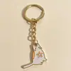 "Gato Flor de Cerejeira" chaveiro fofo vermelho e branco, pingente de lembrança de viagem, decoração de chave de mochila