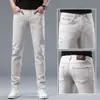 2026 Nuevos Jeans de Pierna Recta Ajustados de Moda de Negocios Color Beige Champán Casual Versátil