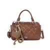 Colección de otoño retro de color sólido para mujer 2026, nueva y moderna, con un elegante bolso cruzado de cadena de color sólido y textura