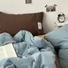 Juego de cuatro piezas de algodón de lavado mixto a rayas estilo vintage minimalista, funda de edredón de algodón puro, sábana de cama 100% algodón, juego de tres piezas para estudiante