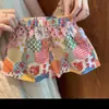 Top de tirantes floral Dopamine Verano Holgado Vacaciones en la playa Hello Kitty Dibujos animados de alto valor Lindo Conjunto de dos piezas