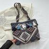 Bolso de gran capacidad para mujer, nuevo bolso escolar portátil de estilo étnico a la moda 2023, bolso de hombro con borlas estilo occidental para mujer.
